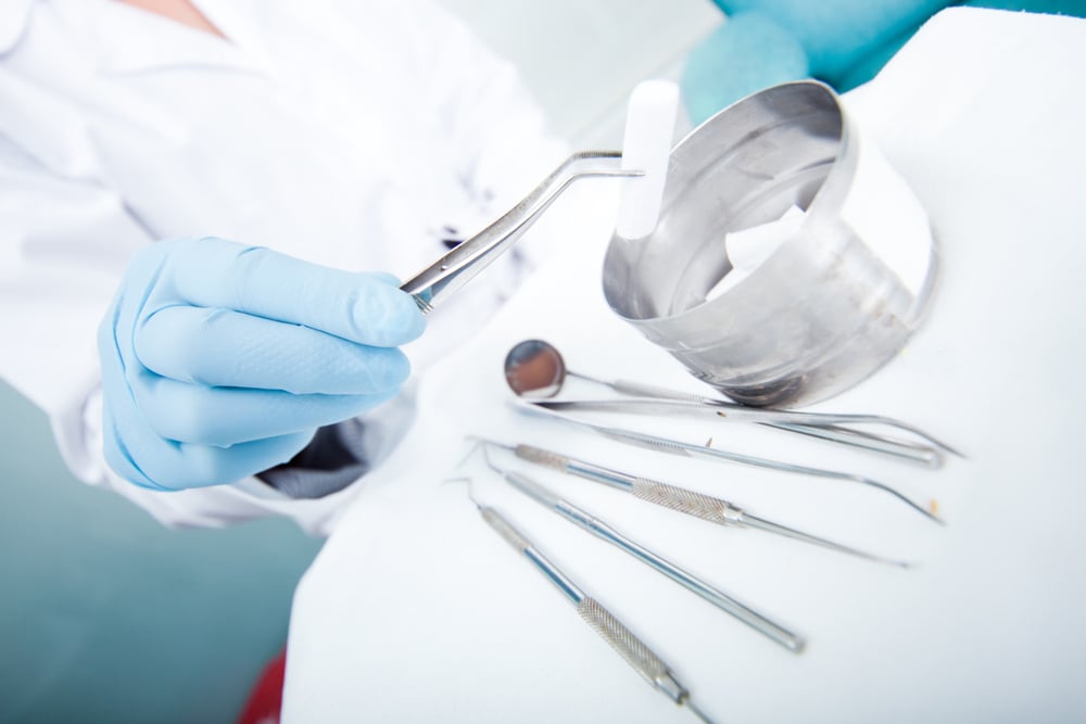 A doctor preparing a patient for jaw surgery A doctor preparing a patient for jaw surgery